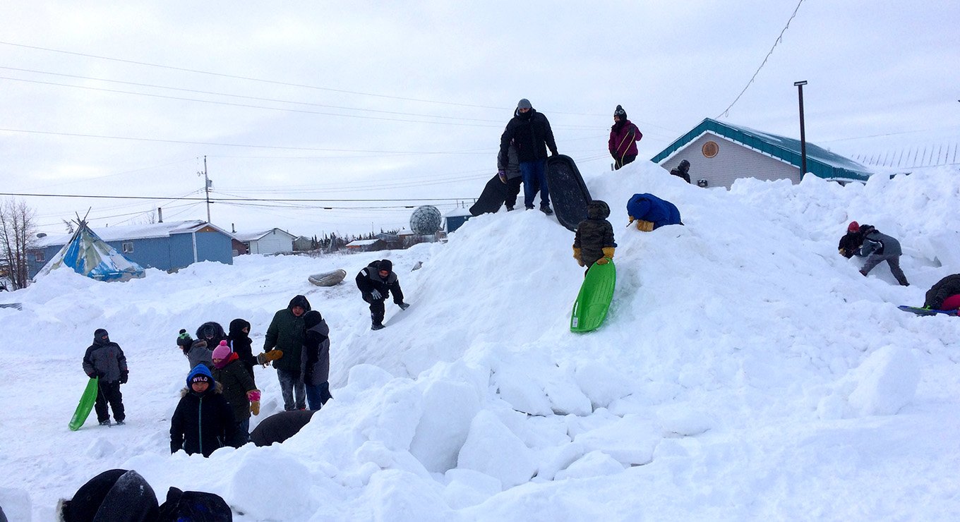Students playing in the snow in Fort Severn First Nation