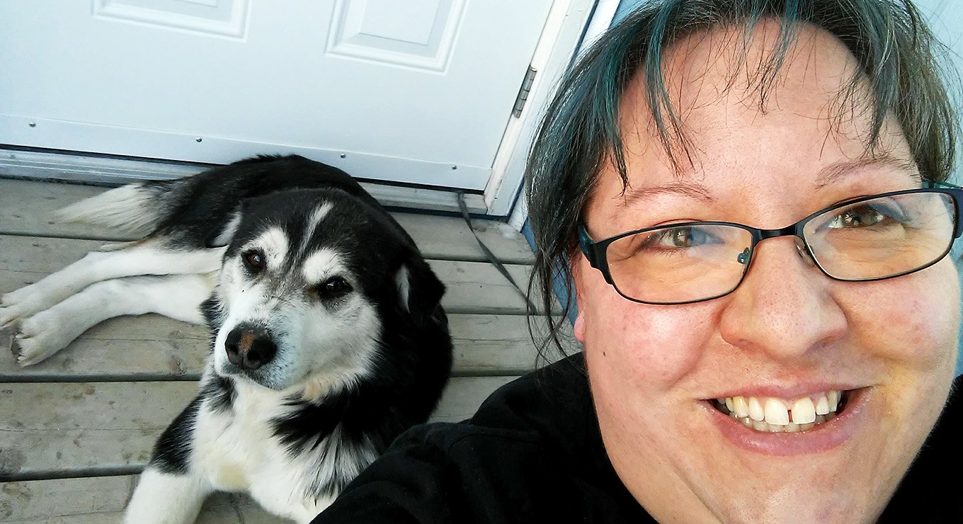 Teach For Canada teacher Kata de Sousa with local dog Brutus