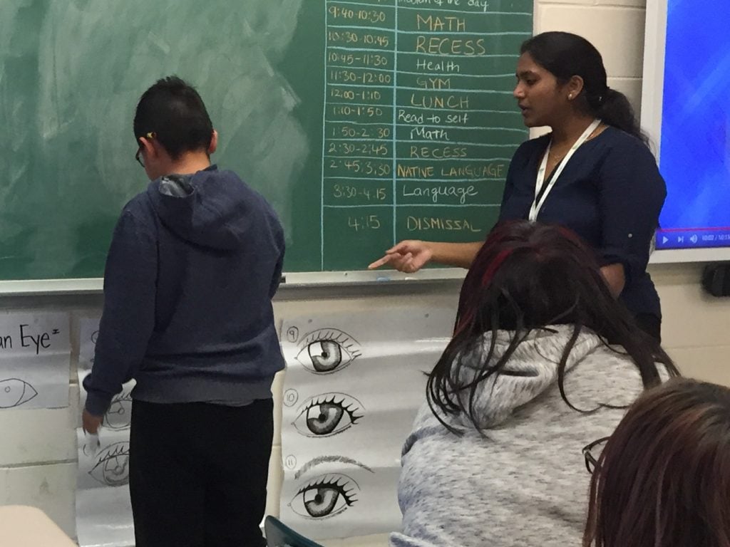 Jeevana teaching her grade 5 students
